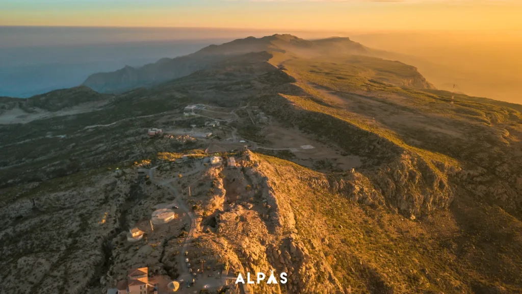 Gorakh Hill Station drone shot during golden hour, blue sky and gold hills