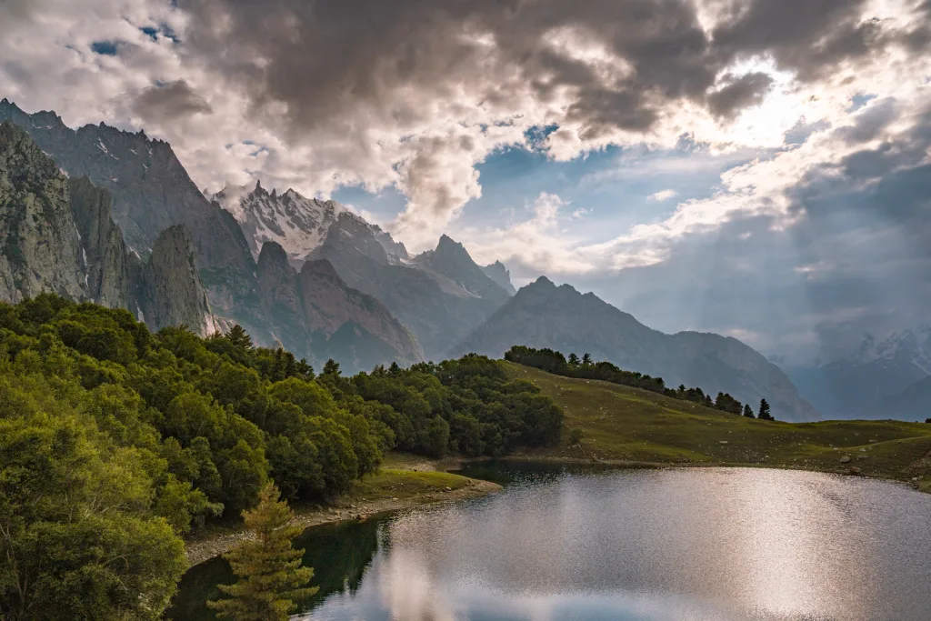 Kutwal Lake in the haramosh valley during dusk with haramosh mountains in the background.