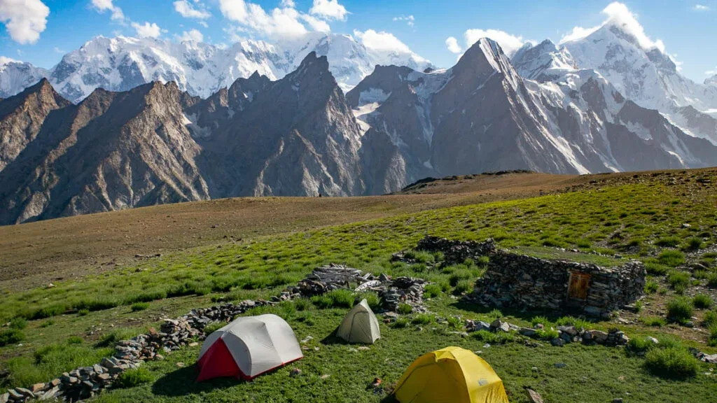 trekkers camping at patundas meadows. treks in pakistan